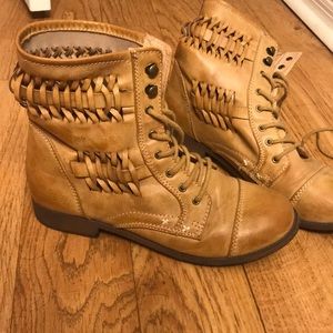 Lightly worn combat boots